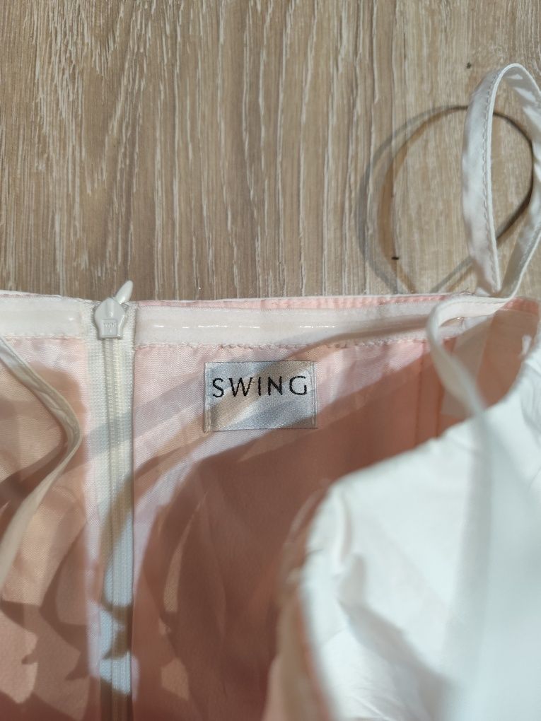 Przepiękna sukienka koktajlowa Swing 38