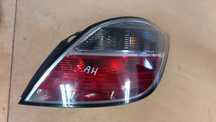 OPEL ASTRA H HB HATCHBACK LAMPA TYŁ TYLNA PRAWA CIEMNA DYMIONA