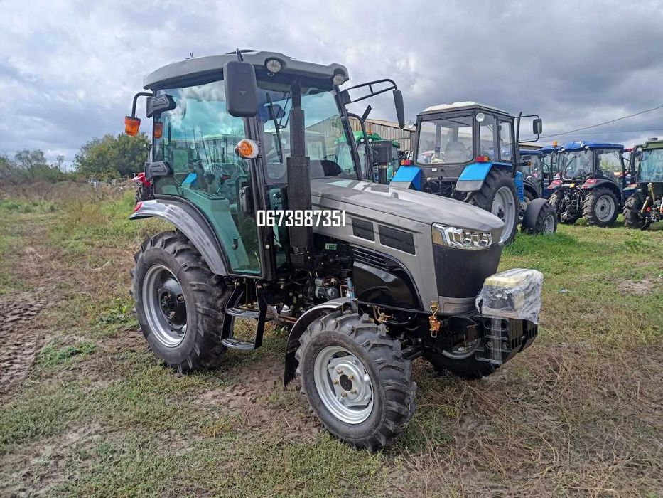 Мінітрактор Скаут 404 C з реверсом, компресором, на широких колесах