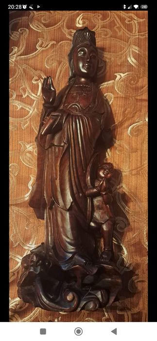 Deusa da fertilidade com o menino