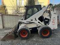 Послуги бобката Bobcat 873