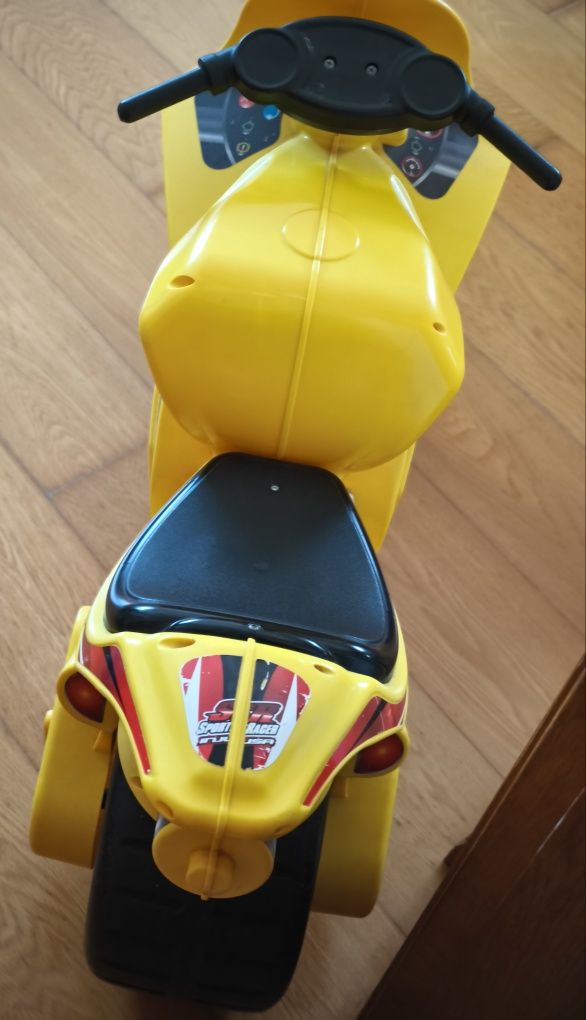 Moto criança amarela