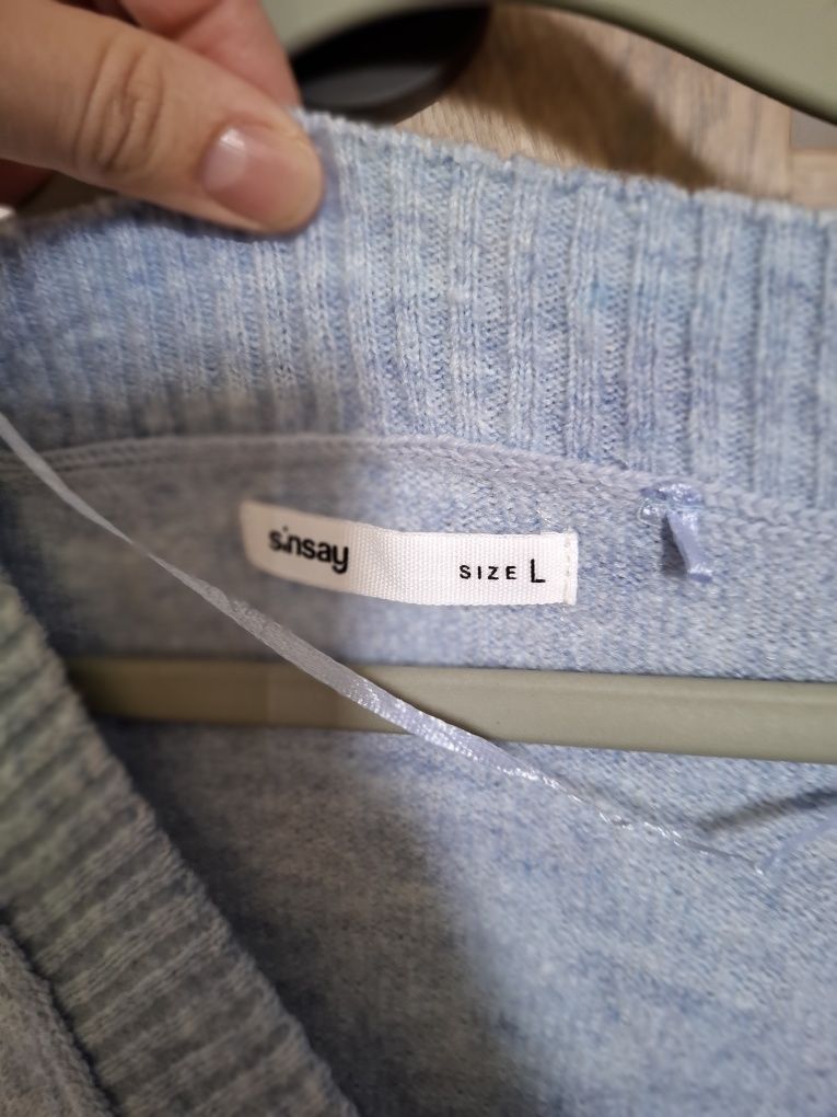 Błękitny sweter Sinsay
