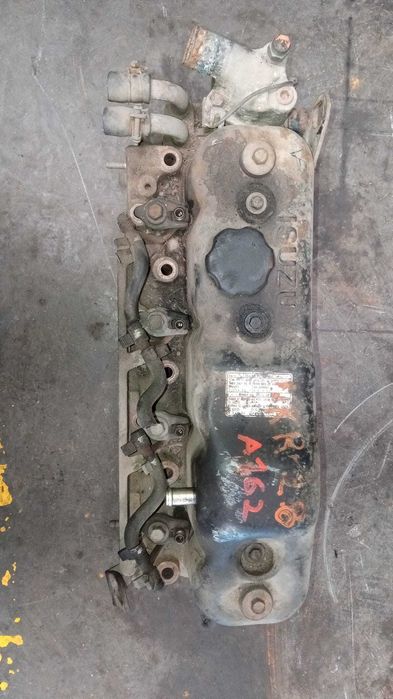 Cabeça motor ISUZU NKR 3.1, 2.8, 3.0,3.3 etc