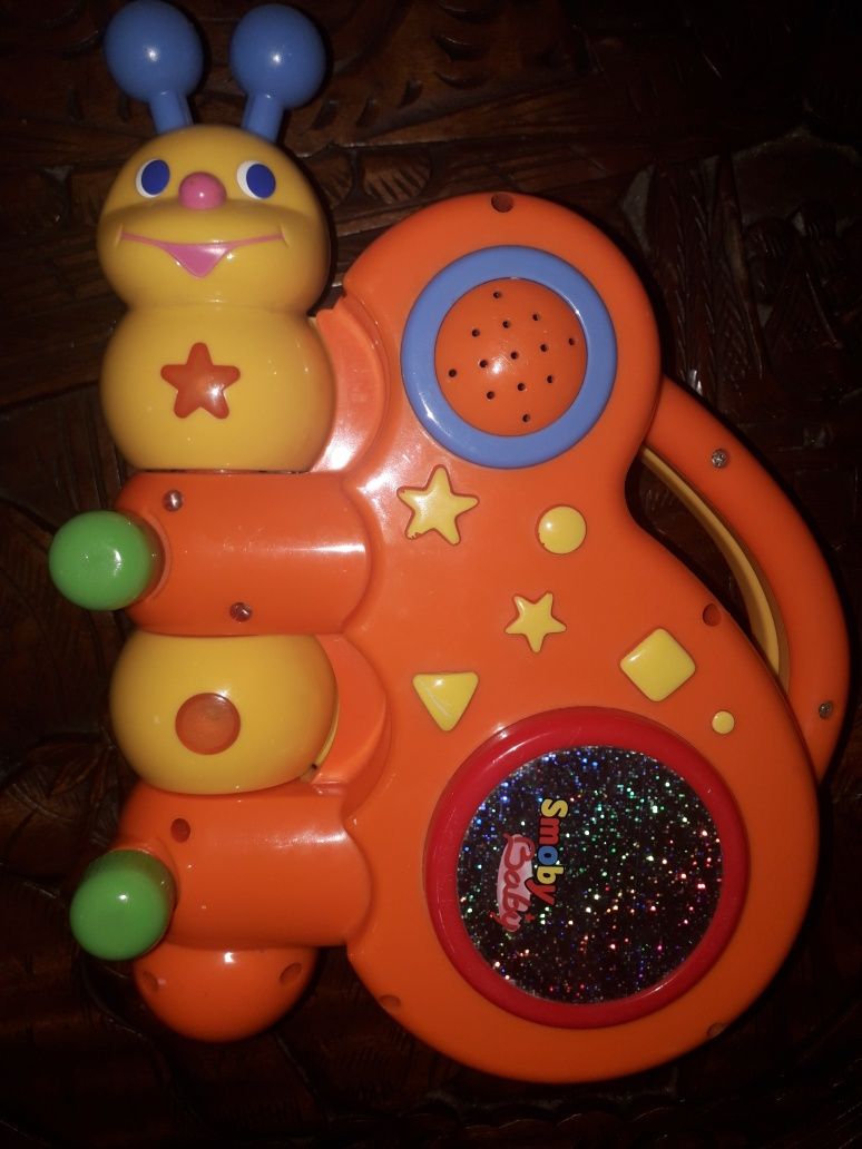 Brinquedos de música a funcionar Fisher Price e Chicco