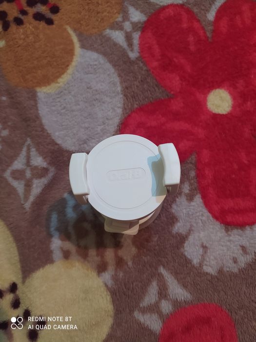 Uchwyt Oral-B na telefon