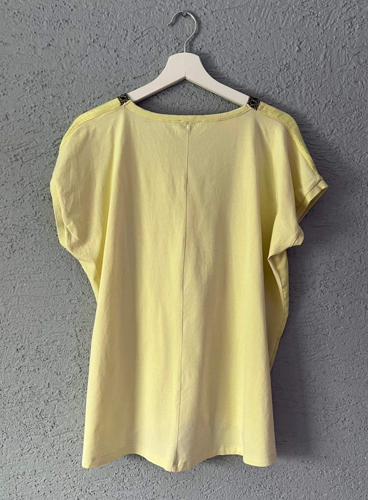 Żółta bluzka firmy Megi rozmiar L/XL