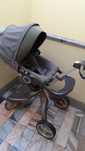 Carrinho bebé Stokke Xplory com chapéu de sol e capa