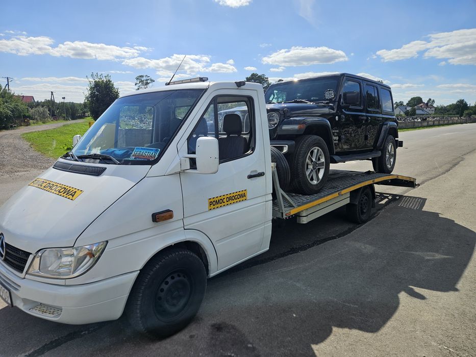 Pomoc Drogowa Laweta Transport AUT  Holowanie Autolaweta 24/7