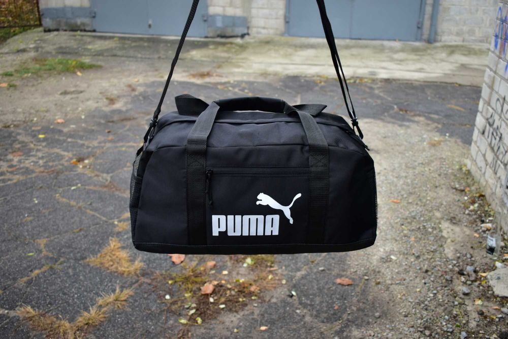 Сумка Puma спортивна - міцна дорожня модель з екошкіряним дном