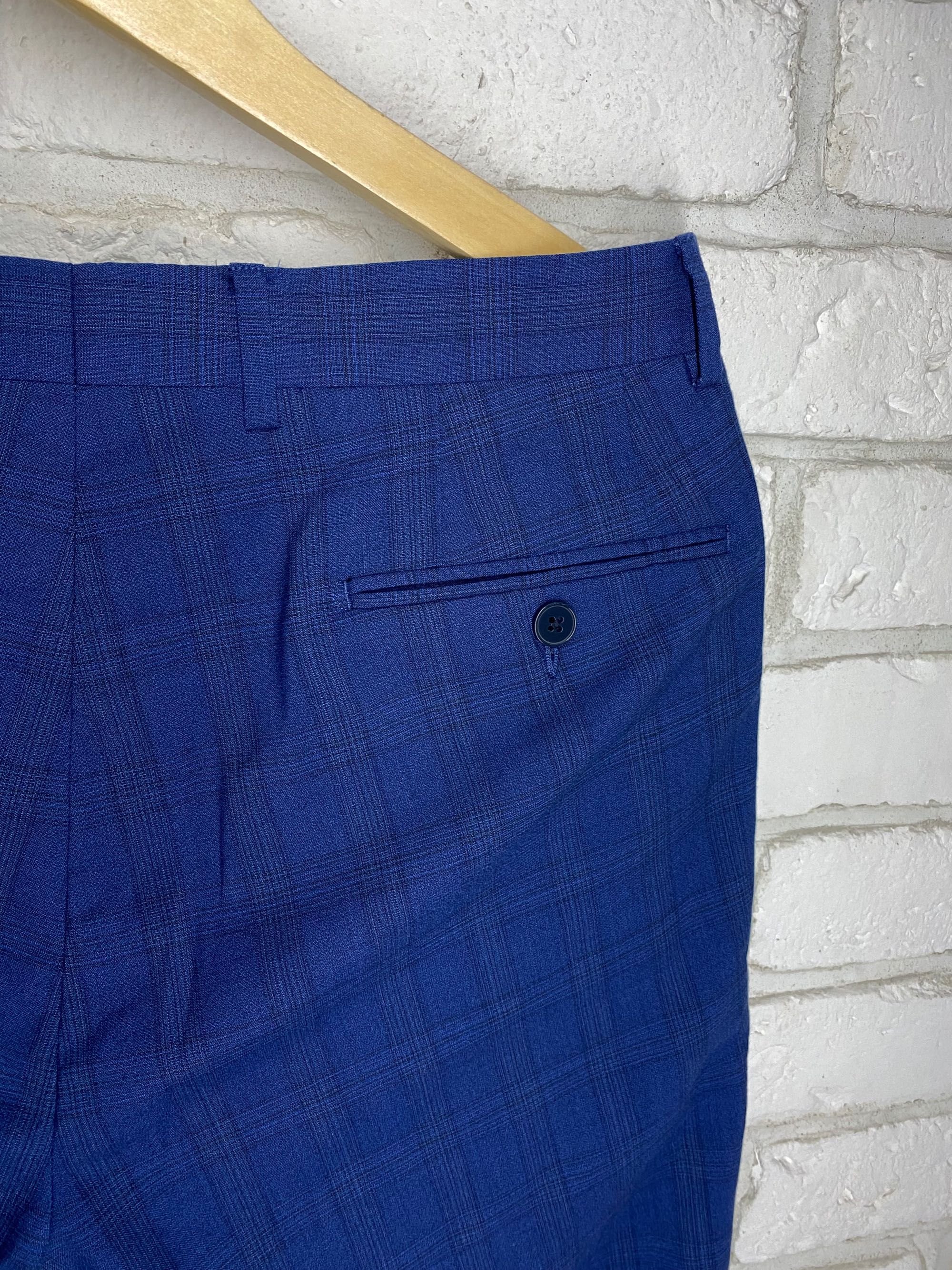 Męskie eleganckie spodnie garniturowe Calvin klein 100% wełna