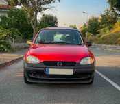 Opel Corsa B 1997 – 5 Portas | Vermelho | 973cc | Com Teto de Abrir