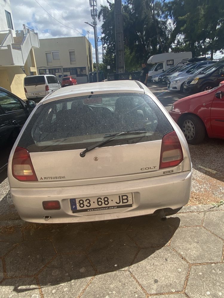 Mitsubishi colt 1997 *ACIDENTADO*