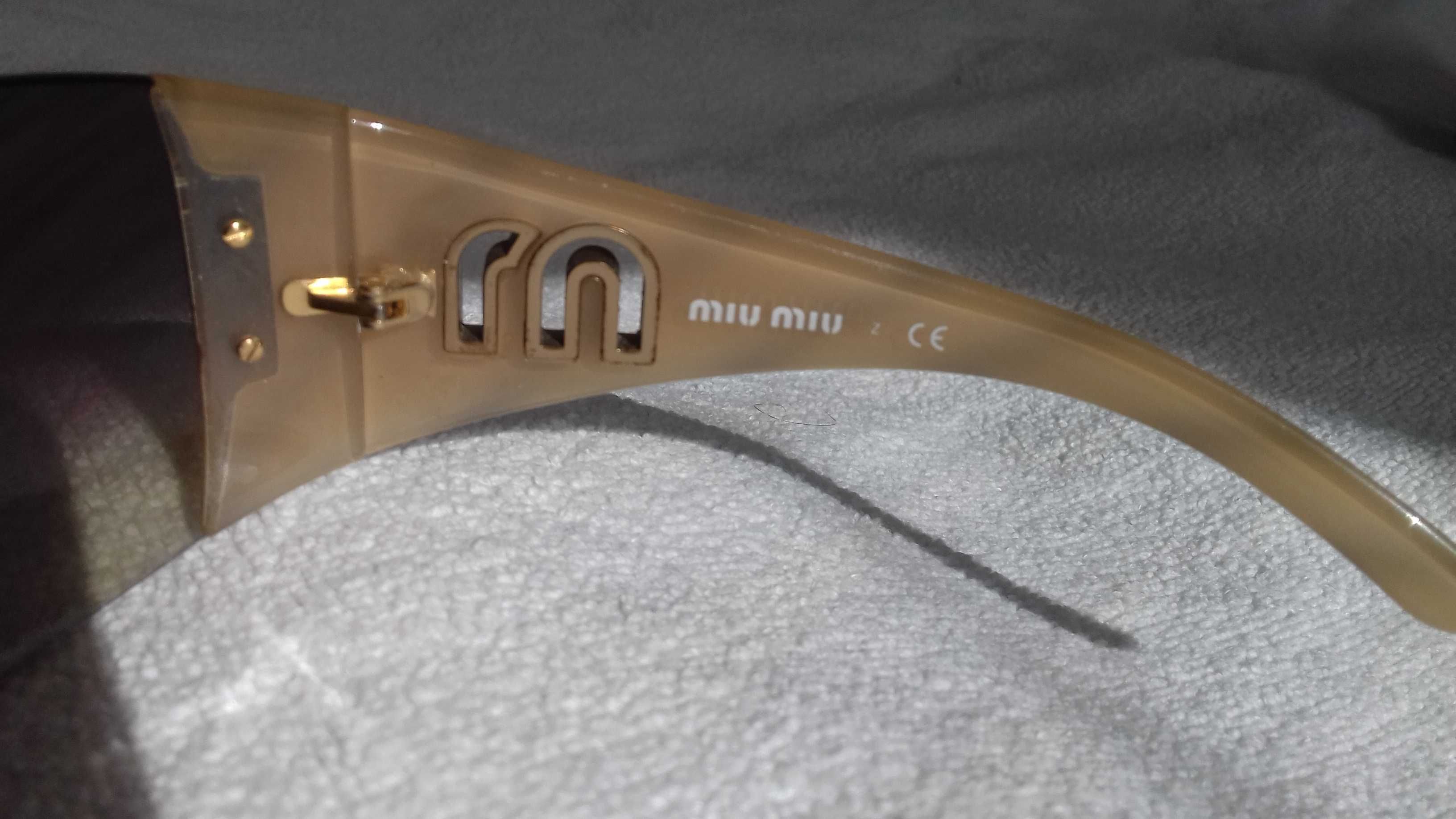 Okulary przeciwsłoneczne miu miu model SMU11H 7AT-6S1 115 2N