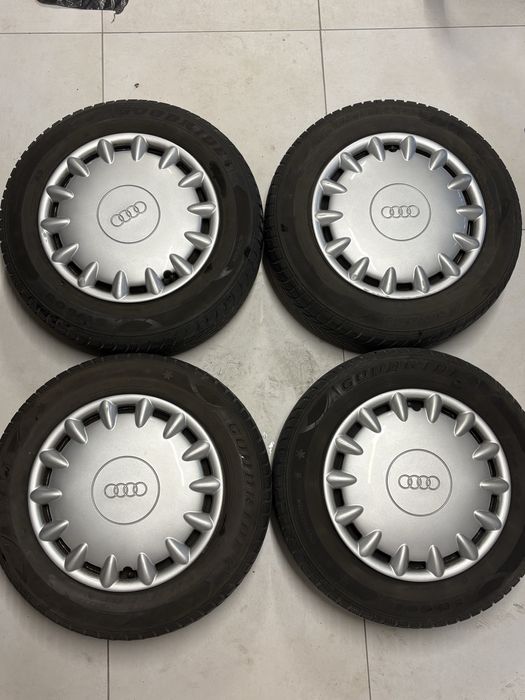 Komplet kół zimowych z orginalnymi koupakami audi