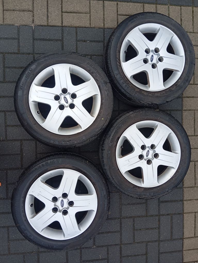 4 Koła Opony Felgi Kołpaki Ford OE Kuga C-Max Focus