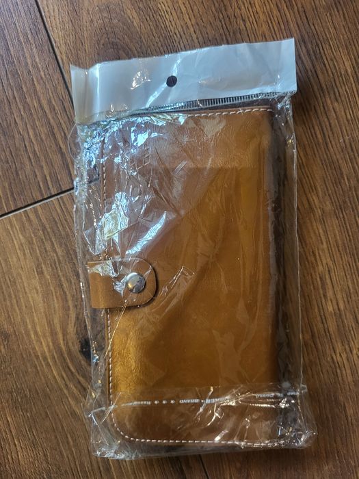 Pokrowiec etui portfel Premium brązowy 4,0-4,7 cala