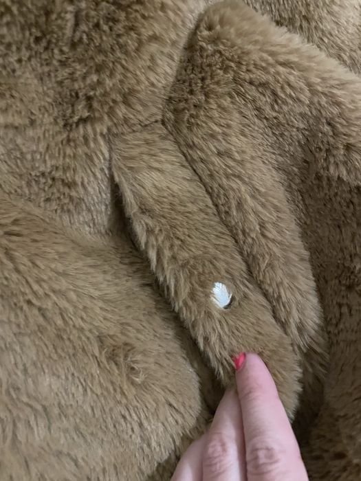 Casaco castanho pelo