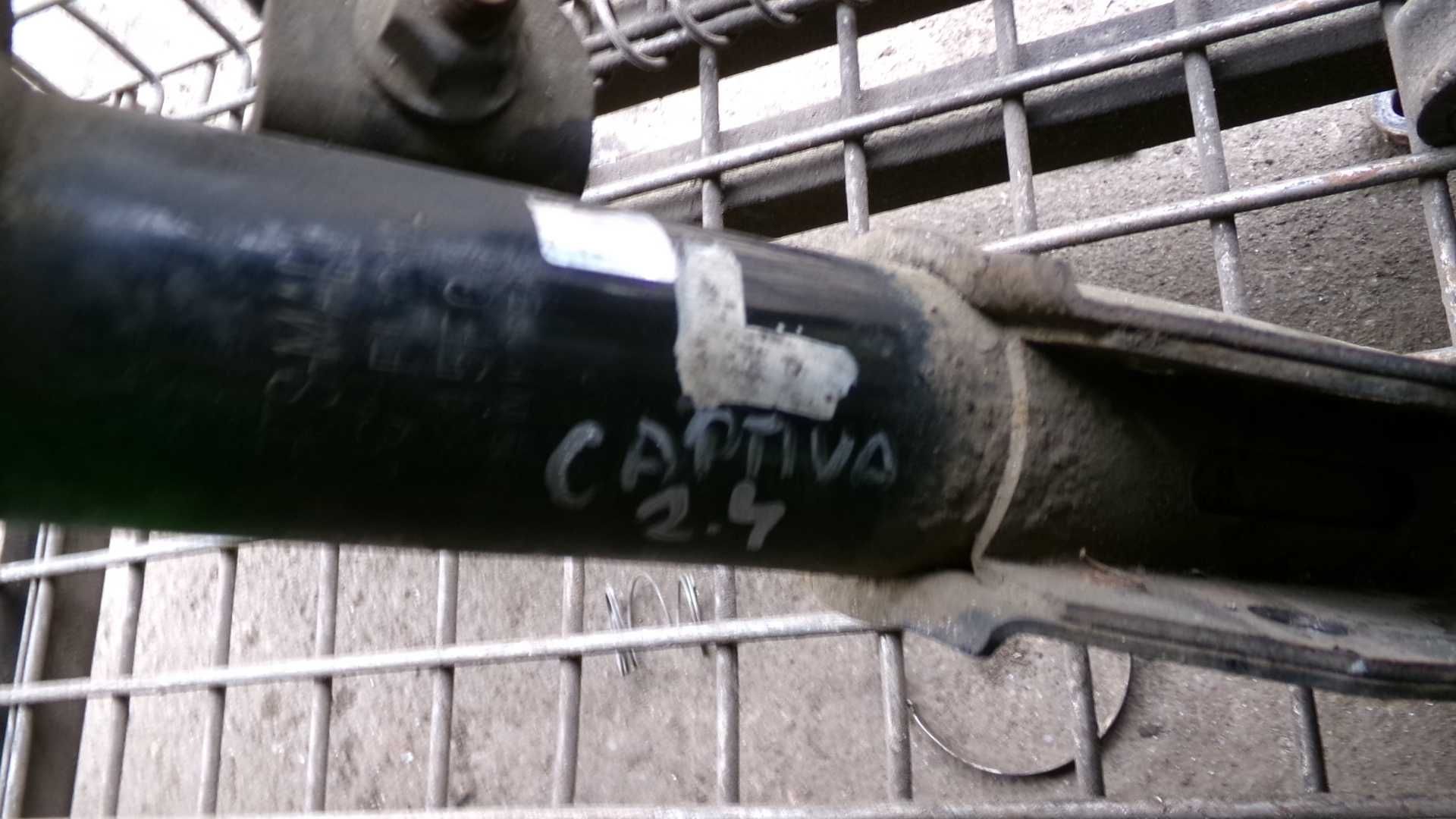 Kwi5 Amortyzator + sprężyna mcperson przedni lewy captiva 2.4
