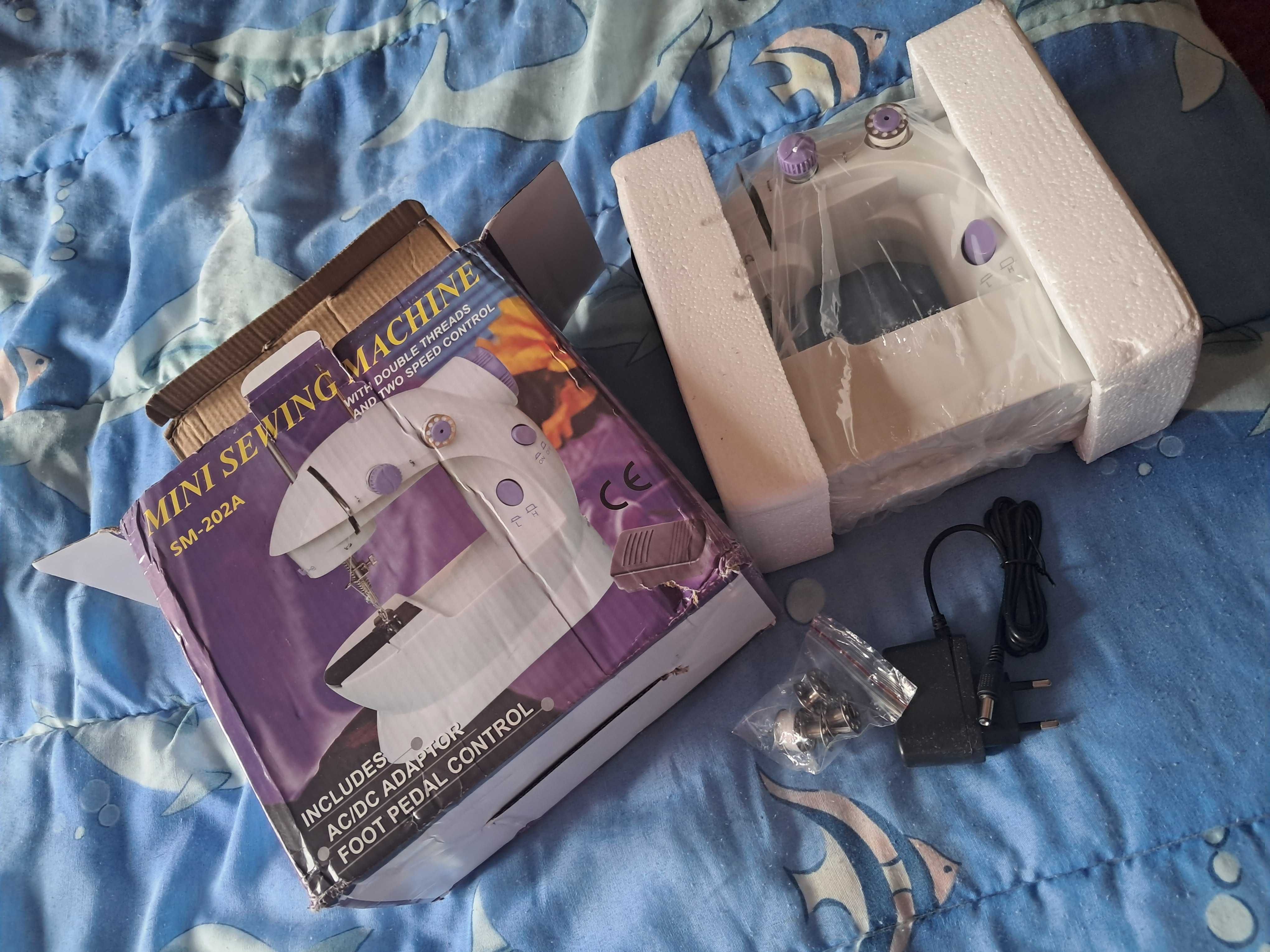 Mini maquina de costura nova