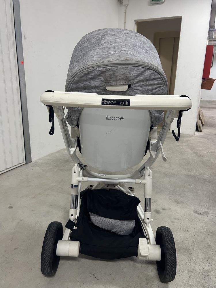 Carrinho marca "ibebe " com ovo