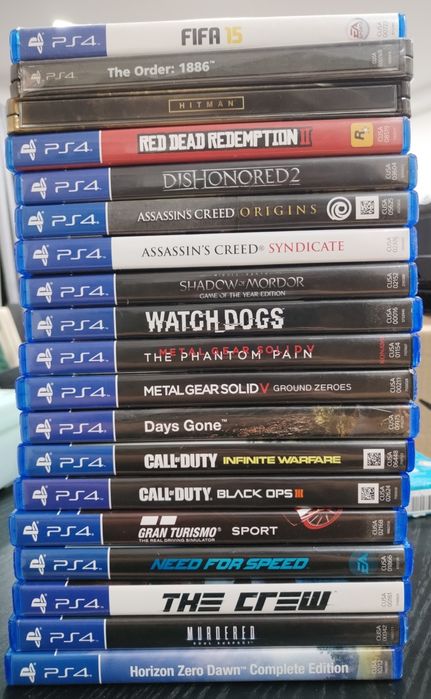 Playstation 4 c/comando e coleção incrível de jogos