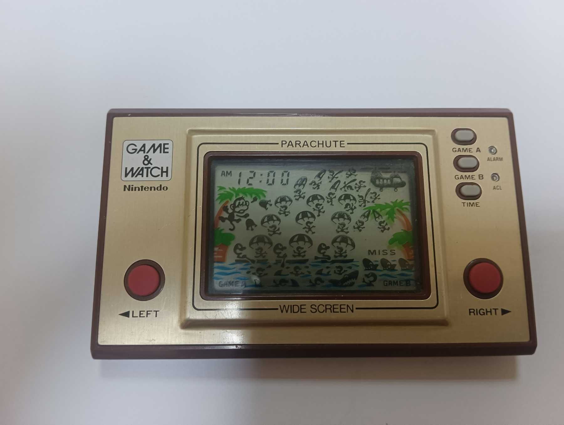 Ігрова та годинникова консоль Nintendo game & watch parachute 1981