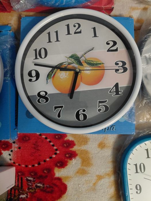 Настінний годинник з мандаринками