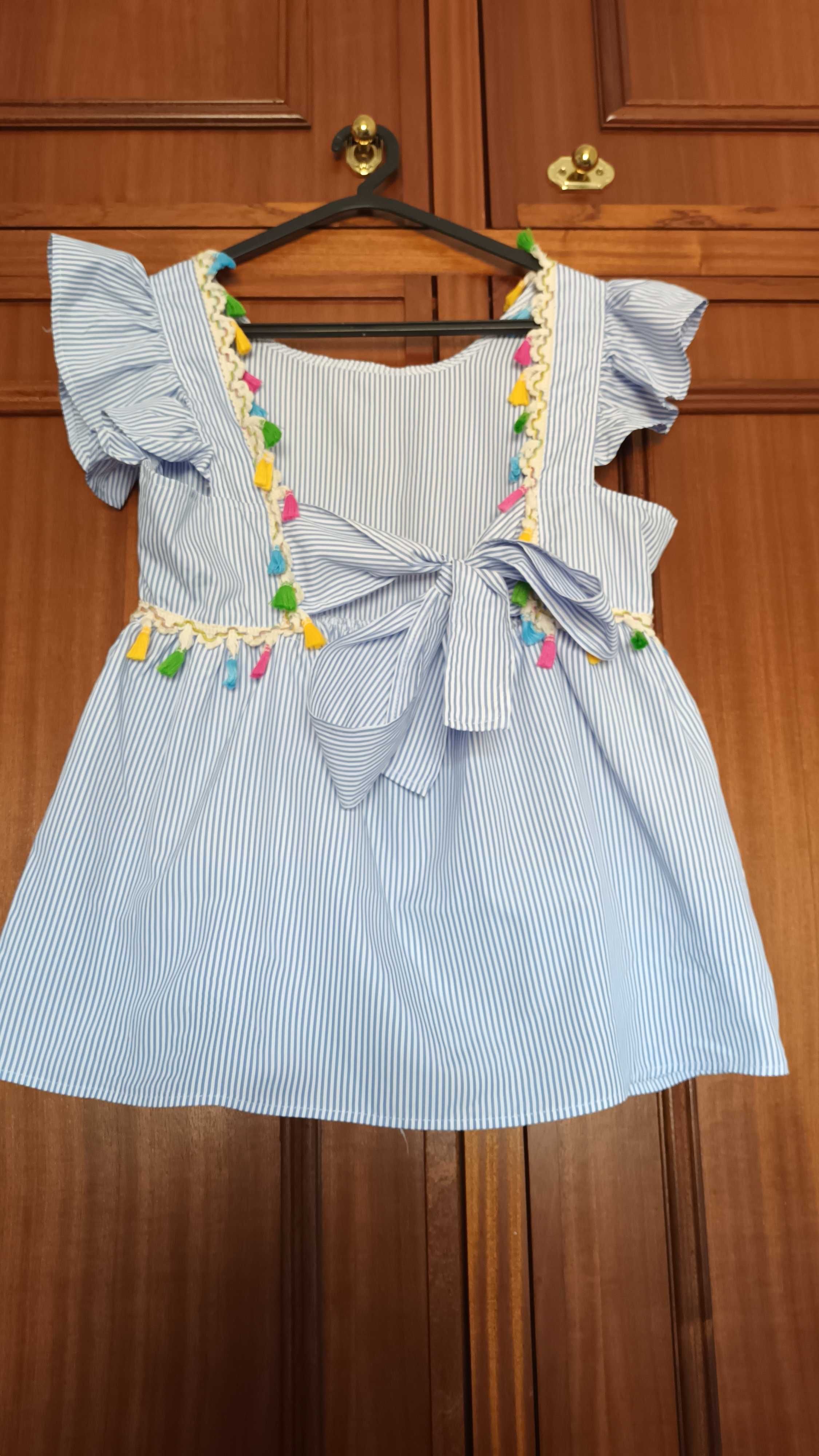 Blusa sem costas e com uma laçada