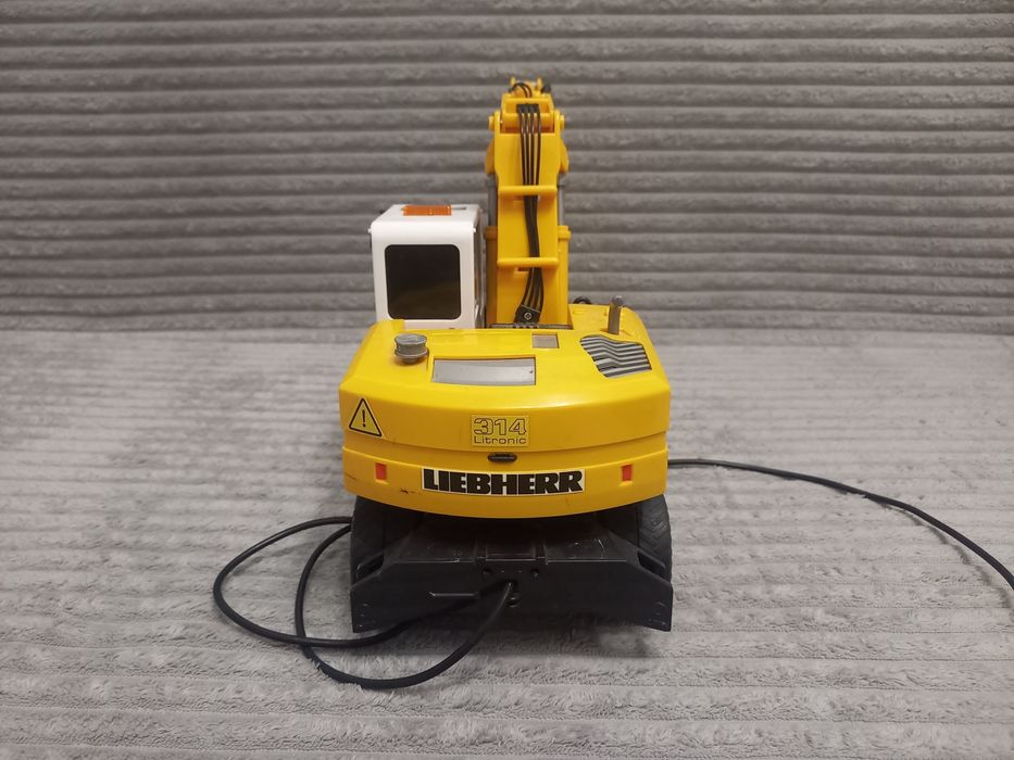 Трактор екскаватор на пульті керування від Dickie Toys