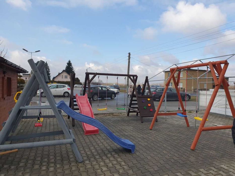 Huśtawka ogrodowa drewniana "BARTEK" z grubego bala  Producent