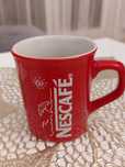 Kultowy kubek Nescafe