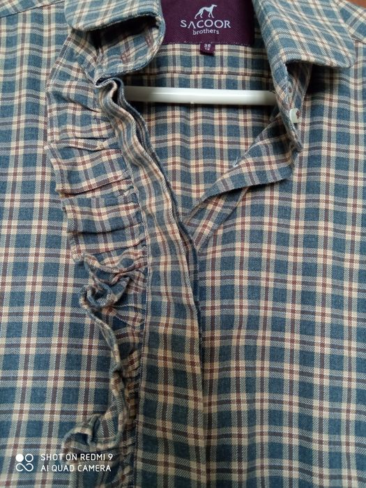 Camisa como nova Sacoor