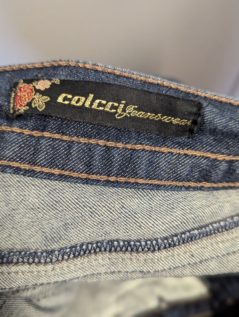 Jeansowe spodnie na szelkach Colcci r. 36