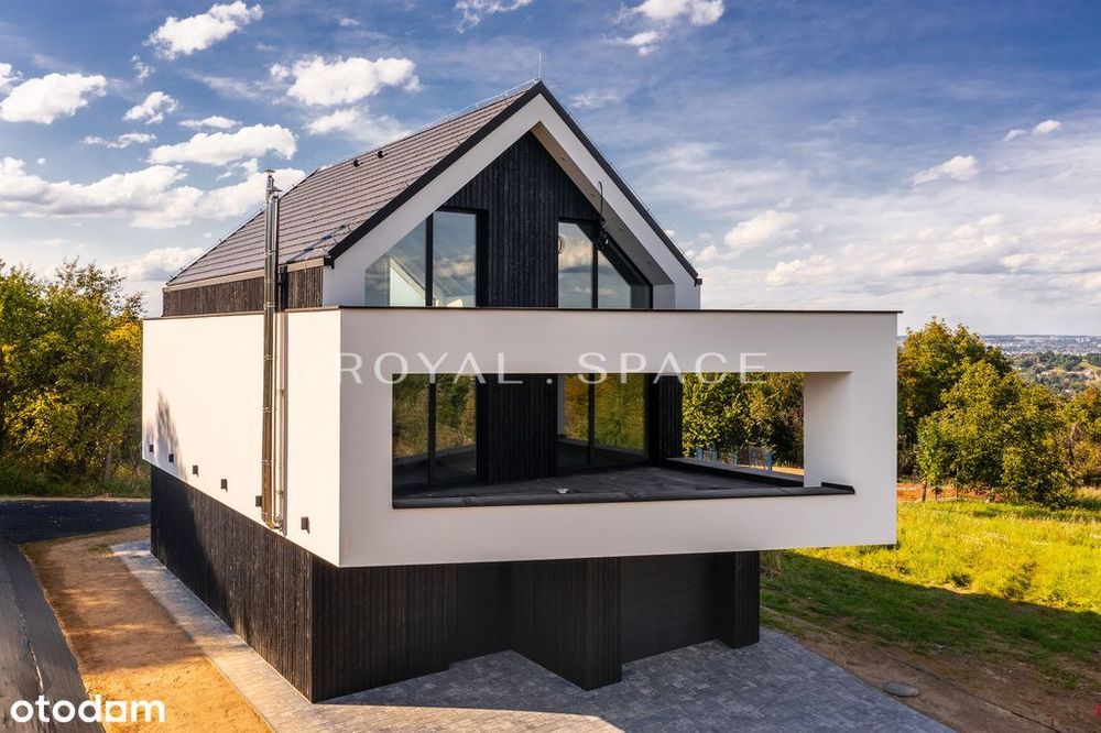 Nowoczesny dom z dużymi przeszkleniami na wzgórzu!