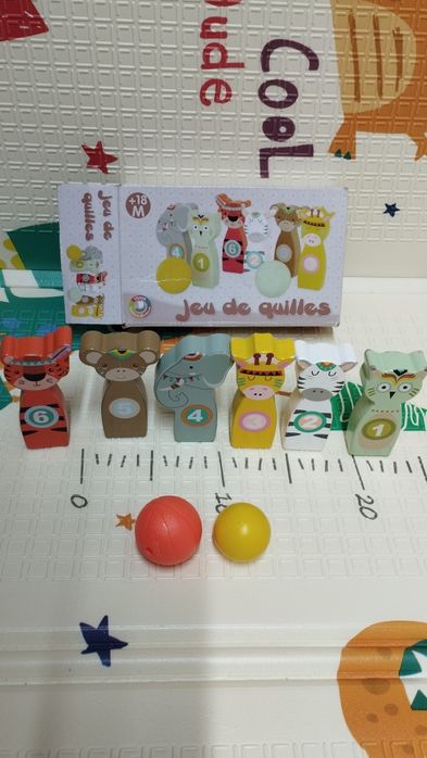 Bowling de animais em madeira