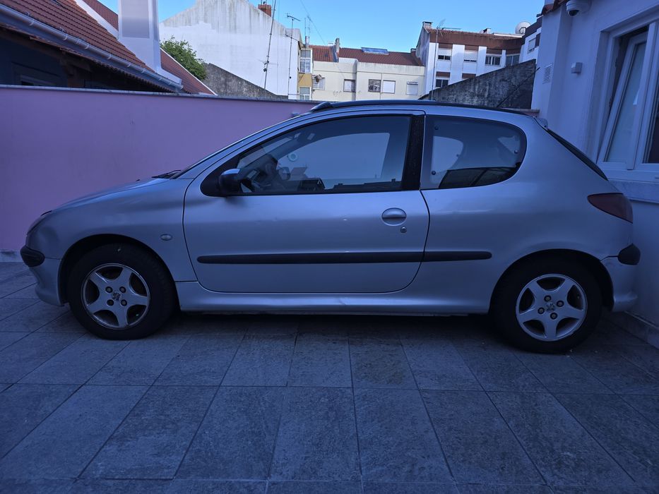 DiESEL 206 HDI Ar cond 130 k KM Tecto abrir Jantes espec Pegeout 5 Lug