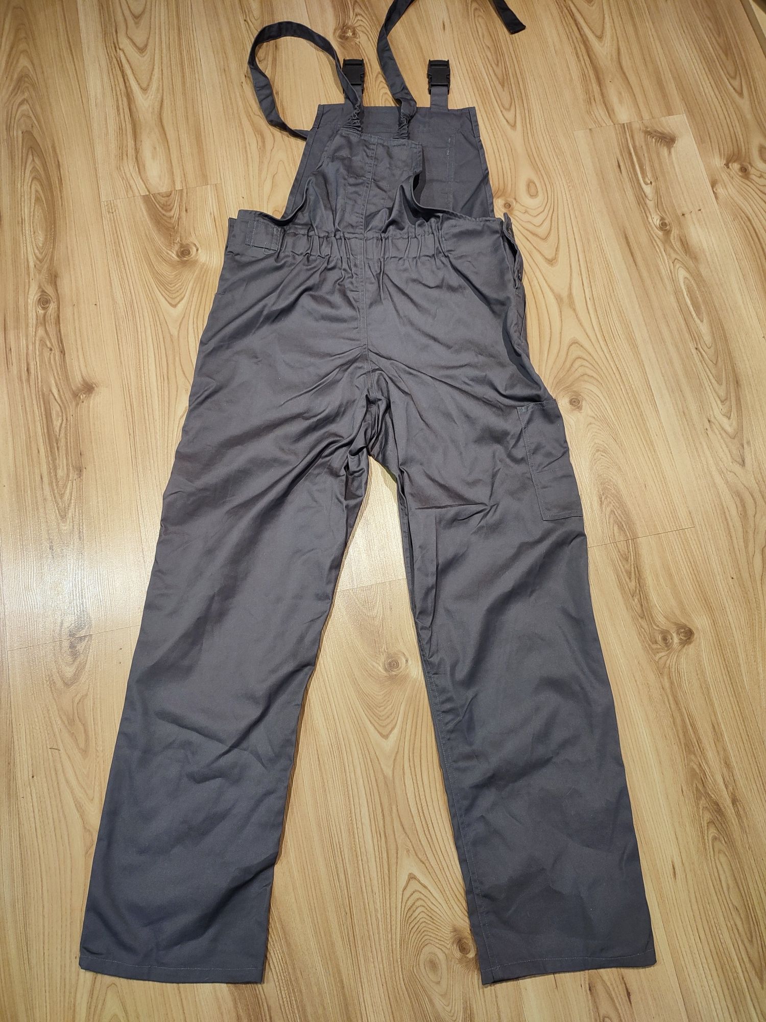 Nowe spodnie robocze REIS, R.176x90, szelki, ogrodniczki