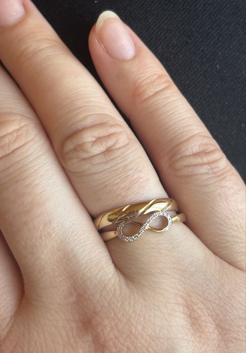 Złoty pierścionek z brylantami 585 r.14