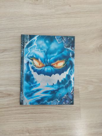 Książka "księga potworów" niebieska