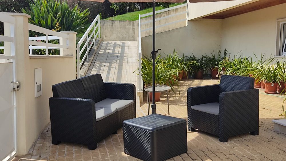 Conjunto de sofás de jardim em resina pretos