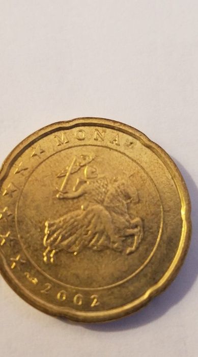 Moeda de 20 centimos Mónaco 2002 com defeito de cunhagem