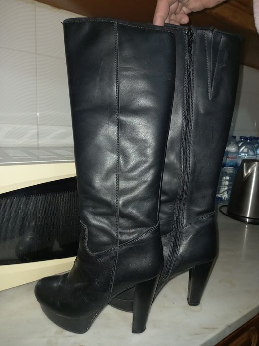 Botas em pele como novaz