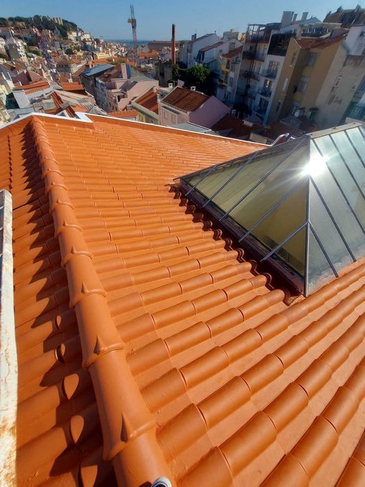 Pintura de prédios em Rapel/telhados
