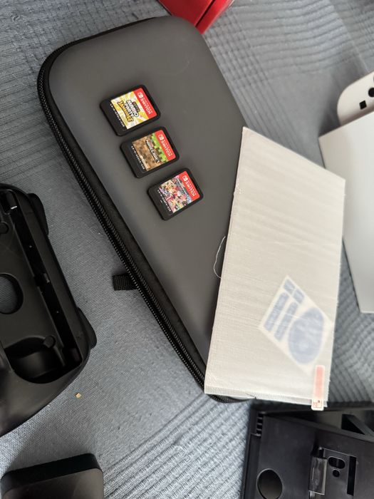 Nintendo switch oled + jogos + acessorios