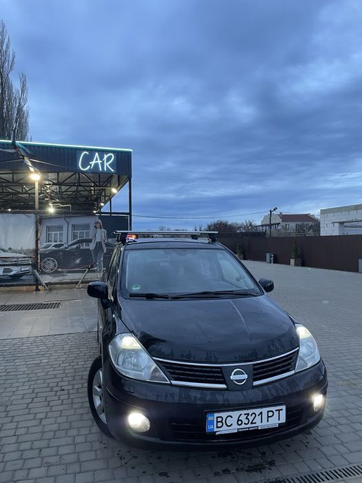 Nissan tiida 1.6 бензин
