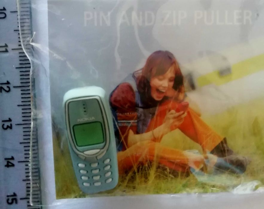 Pins e porta-chaves de publicidade á Nokia