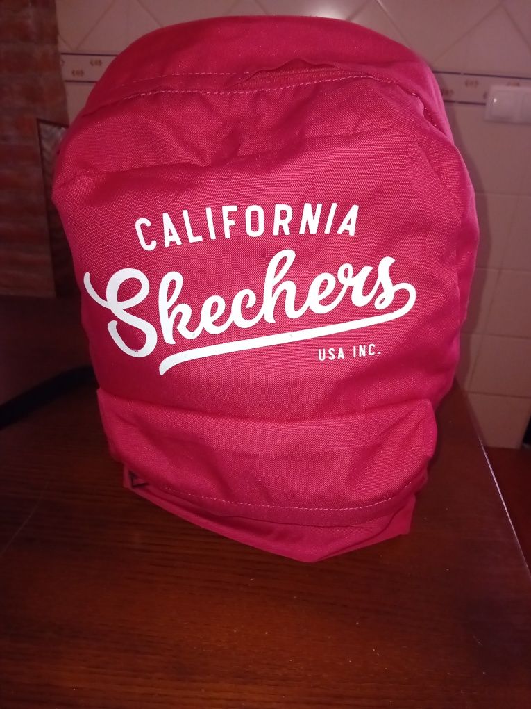 Mochila Skechers ótimo estado