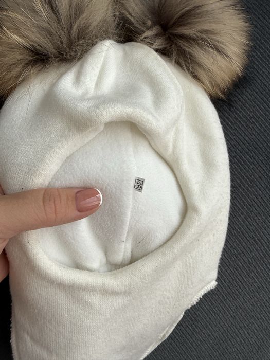 Продам шапку , мех натруланый