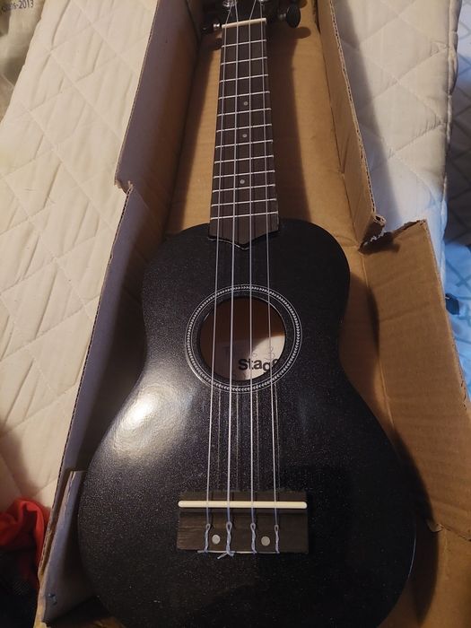 Instrumento musical ukelele escolar